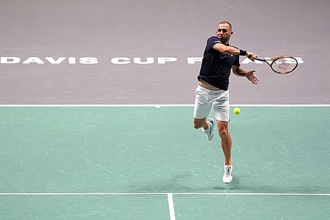 Davis Cup Tennis, Britain vs Finland: Britain's Daniel Evans returns the ball to Finland's Eero Vasa